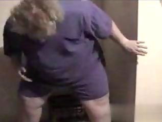 Curly fat wife sucks a glory hole cock on camera