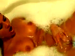 Cute Teen Takes Big Dildo Bubble Bath