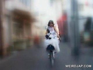 Asian teeny riding the bike with no panties gets very wet