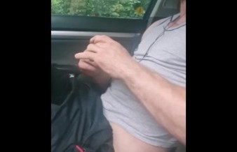 Masturbate in a car on parking in the city