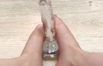 Masturbating the dildo with my foot and moaning