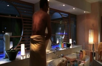 Stephan Kampwirth strips naked and wraps a towel around his waist