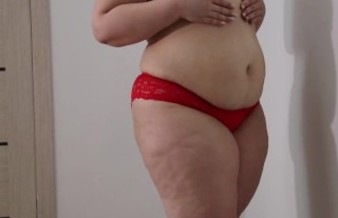 BBW shakes stuffed belly and fat ass in panties. Fetish.
