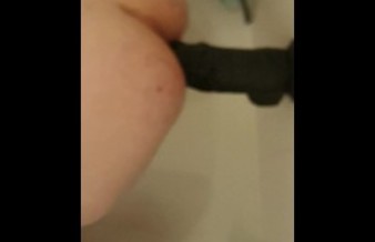 Taking my 8 inch black cock in my ass and loving it