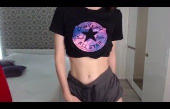 Skinny Teen teases with Shorts and belly