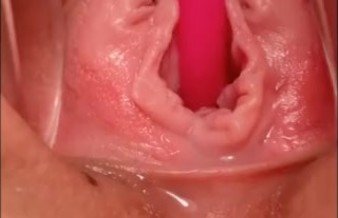 Extremely close up of a cumming pussy