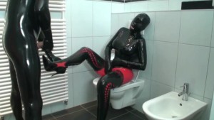 Couple Total Encased In Latex Catsuit Pissing Each Other And Fucking Hard