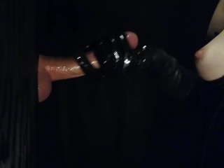 Black latex gloves at the gloryhole