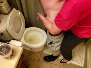 Helping my neighbor by holding his dick while he pees in the toilet while my boyfriend's at work