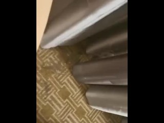 Pissing on hotel curtains