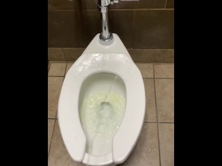 Naughty Piss Slut Makes an absolute Mess of a Public Bathroom with a Powerful Standing Piss