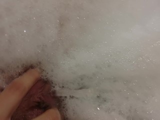 Girl is pissing in the pool while taking a bath extreme squirt