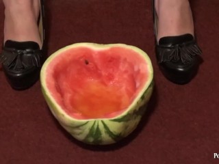 With a hairy pussy brunette pissing on watermelon