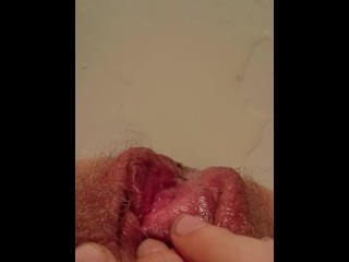 Moaning from pleasuring hairy pissing pussy