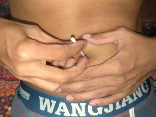 Sri Lankan gay boy cleans his belly button. How to clean the belly button.