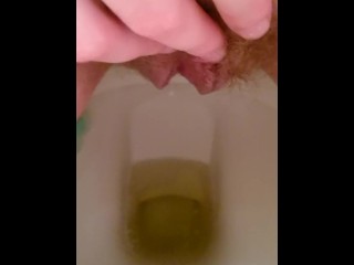 Close up hairy pussy piss and rub on toilet