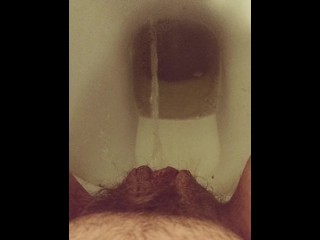 Close-up hairy pussy pissing  on public toilet after holding