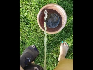 Girl Fills Planter With Piss Outside