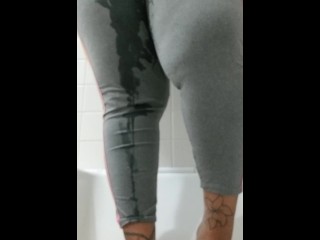 Naughty girl pisses in grey tights | pee desperation
