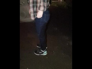 Sexy gf re wets her Jean's in the car, then finishes soaking them standing!