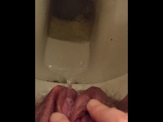 Rubbing my pissing, hairy pussy on a dirty toilet after holding