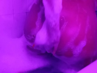 Huge tits an big ass got wet and soapy in the bubble bath.