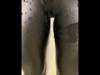 Wet slut takes a shower in leather leggings