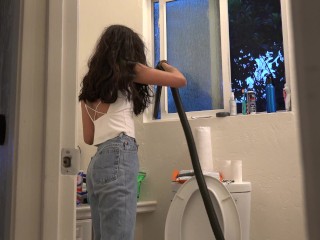 Bombshell Desi Girl Vacuuming the Bathroom in Crop Top and Jeans