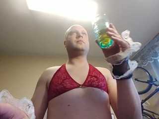Slutty guy pissing into a glass and drinking it