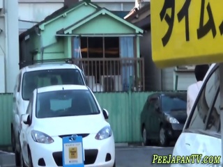 Japanese ladies urinate on the street