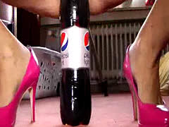 Busty Amateur Fucks A Huge Cola Bottle And Fisted