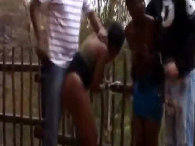 African girls get tied to fence and abused by some crazy dudes