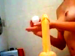 Riding A Long Dildo In The Bathroom