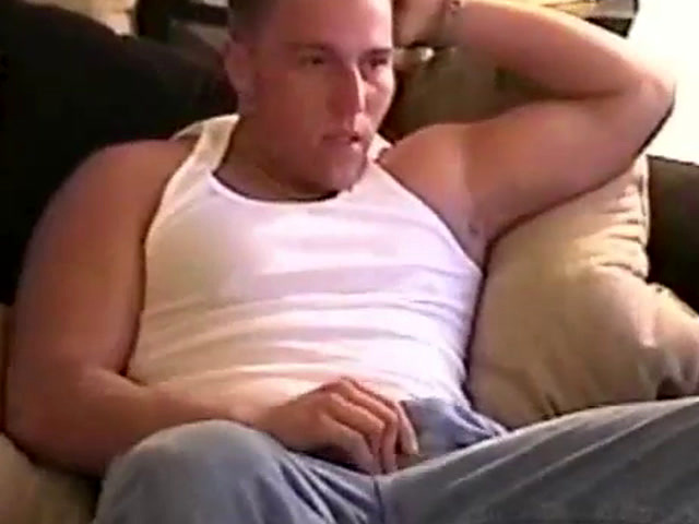 Straight muscular hunk wanking on couch
