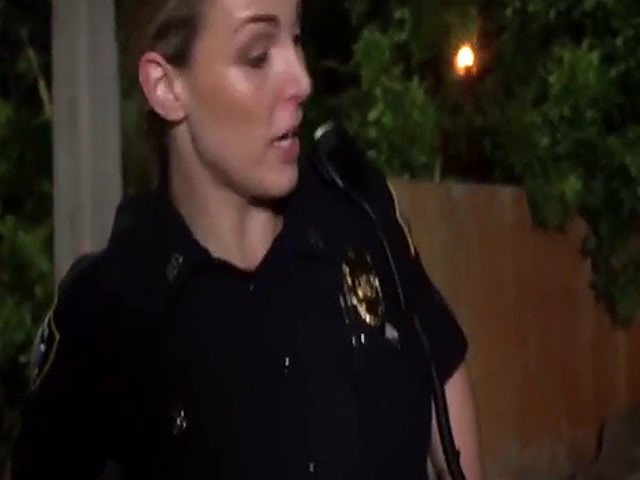 Busty cops abusing black stud outdoors in threeway
