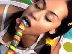 Teen In Pigtails Sucking And Licking On A Lolli Po